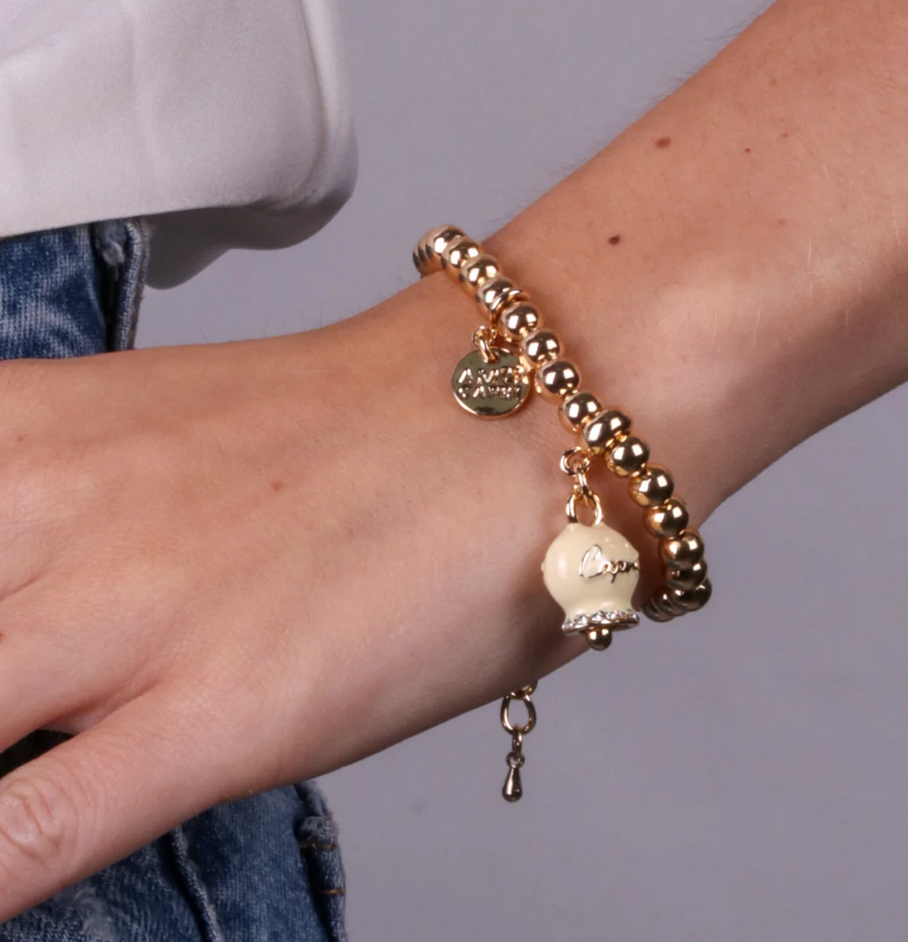 BRACCIALE CON CAMPANELLA CREMA SCRITTA AMO CAPRI